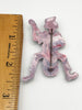 Vintage celluloid music man brooch pin